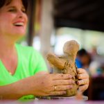 Serena molding a piece of clay. This is the start of the mold making process