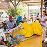 Minister Ruggenaath visiting the Factory